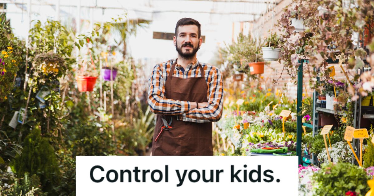 Man with apron standing in the gardening area