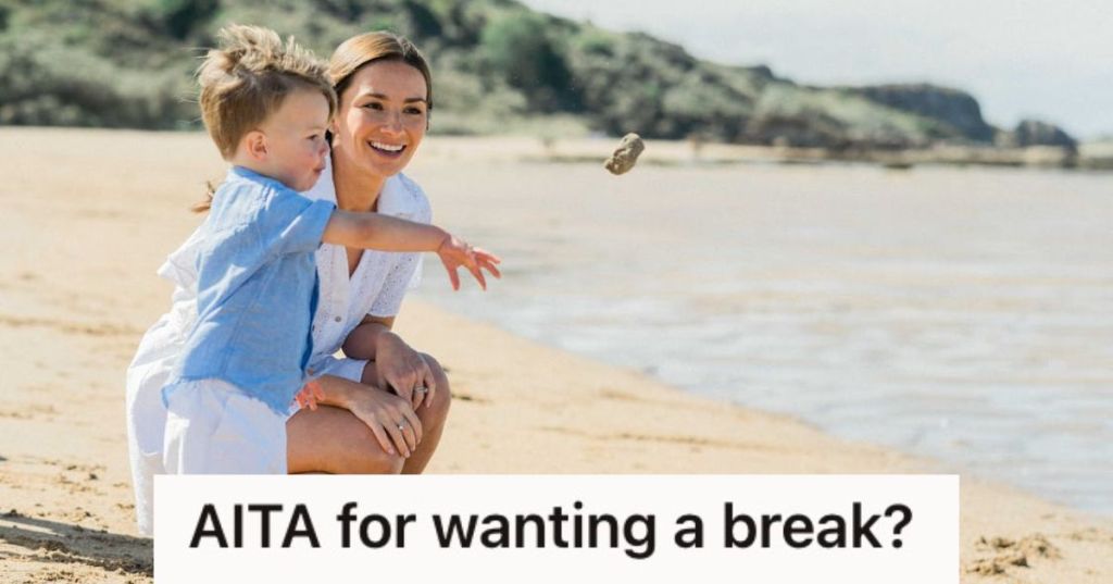 Woman playing with a toddler on the beach