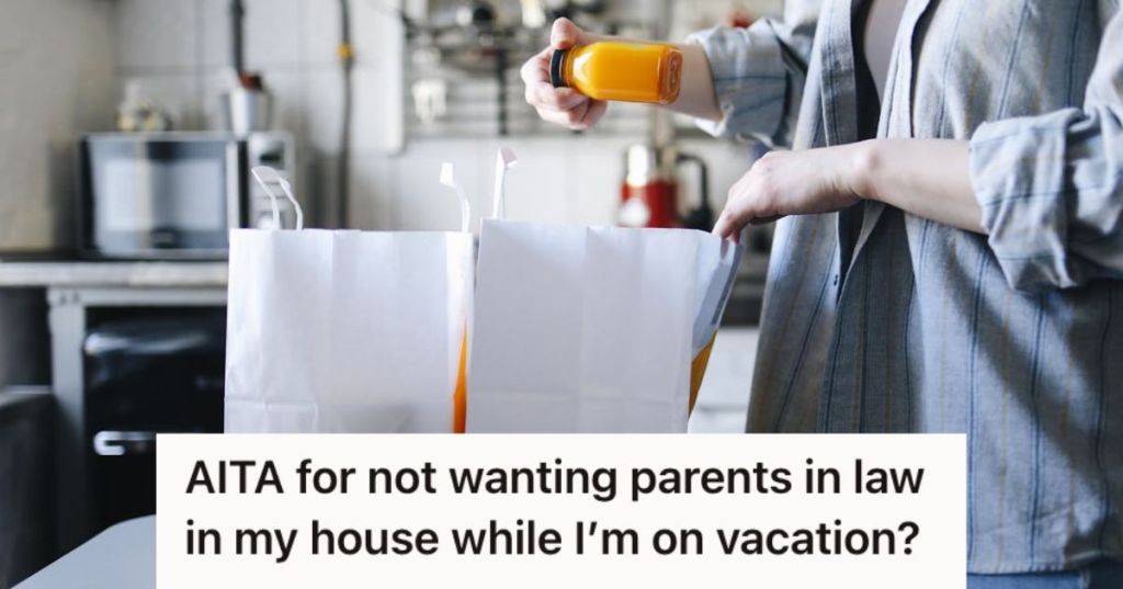Person unpacking bags of groceries in the kitchen