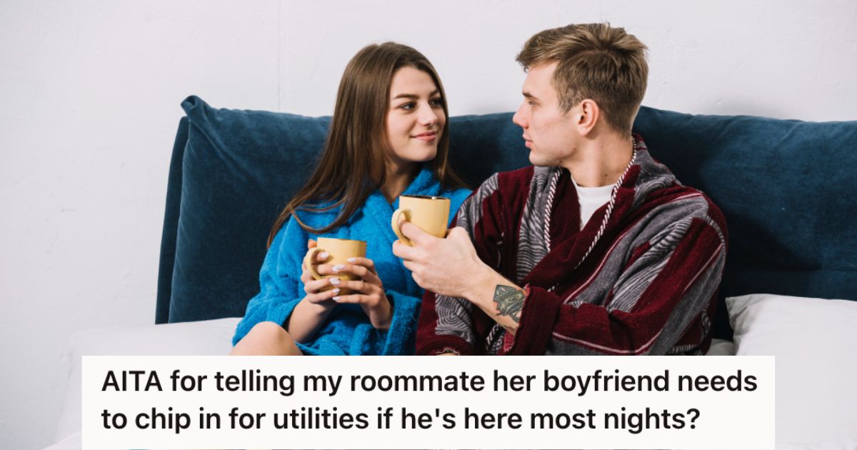 Man and woman wearing pajamas while drinking coffee in bed