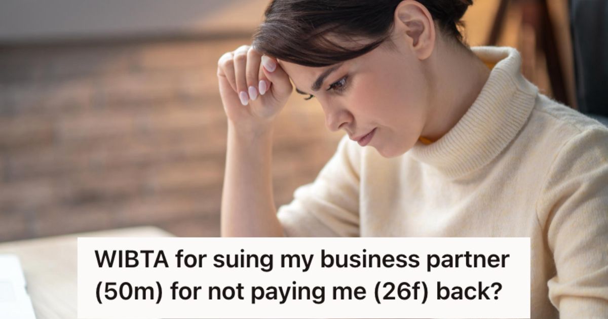 Woman feeling stressed while looking at some documents