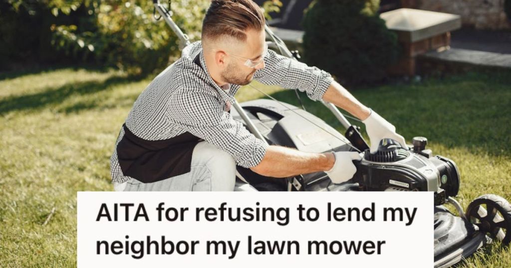 Man fixing his lawnmower