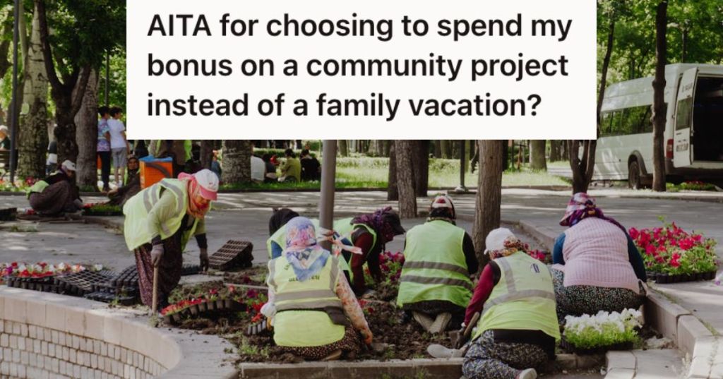 Community workers helping each other clean in cleaning the park