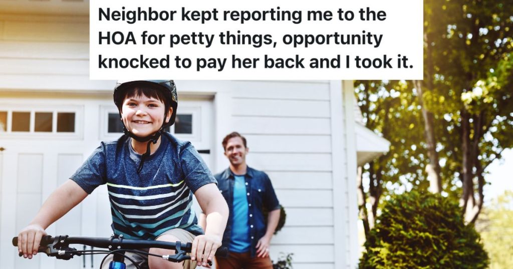 dad watching son ride bike in driveway