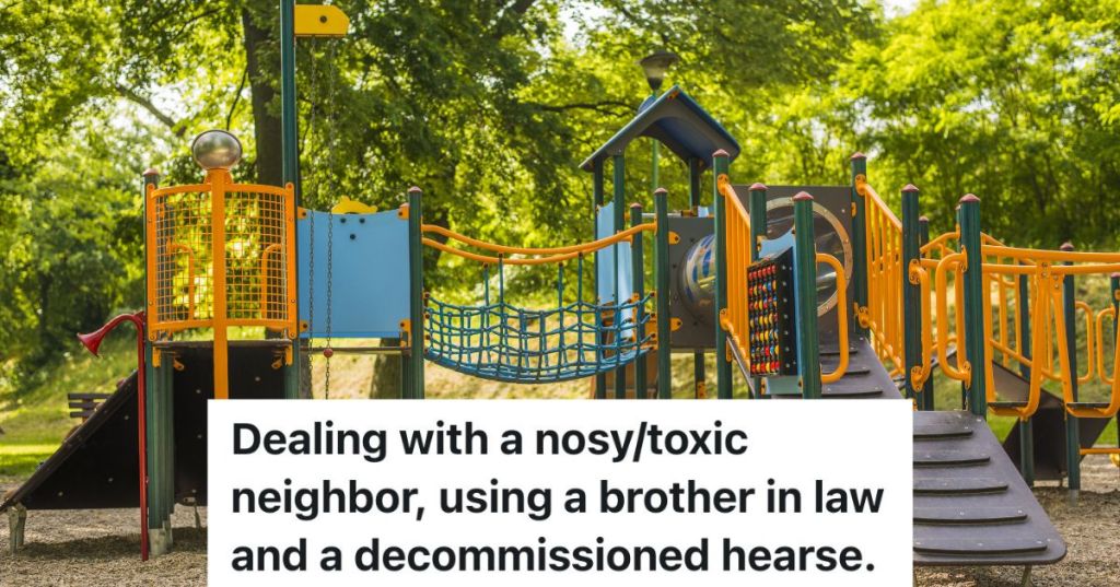 colorful playground in grass with trees nearby