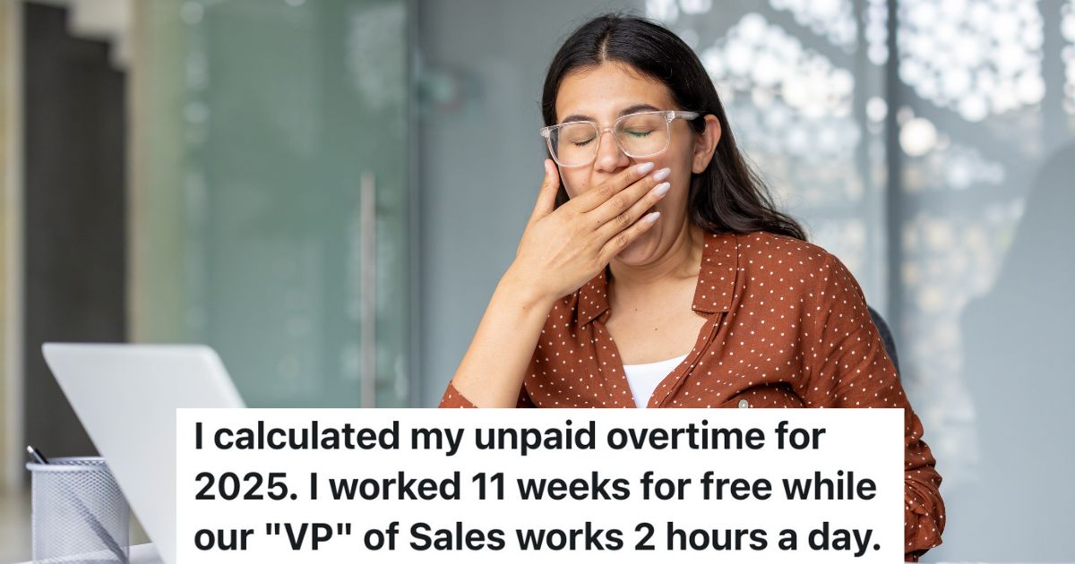 business woman yawning at her desk