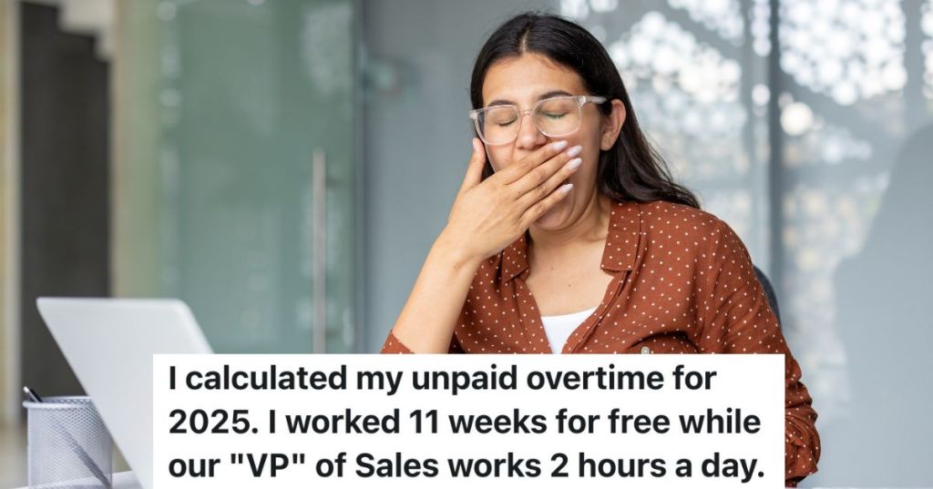 business woman yawning at her desk