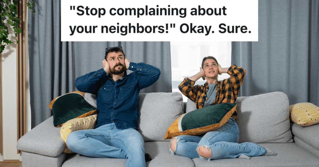 man and woman covering their ears and looking up towards ceiling
