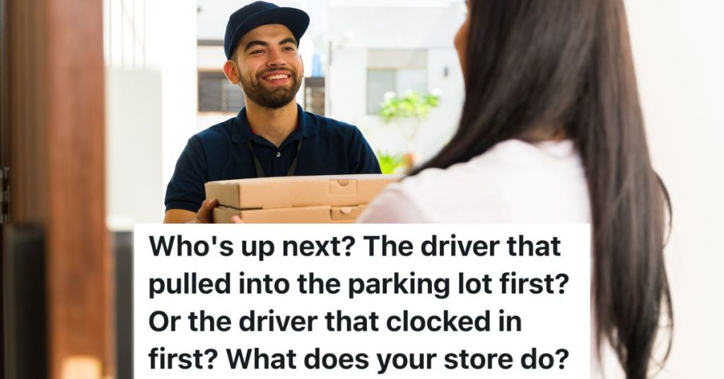 pizza delivery guy handing pizza boxes to female customer