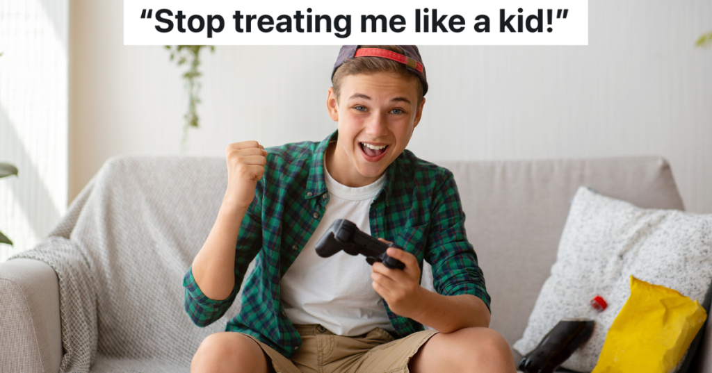 happy teenage boy playing video games