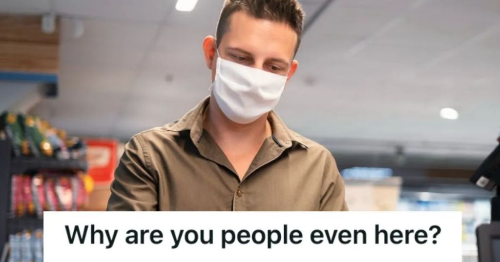 man wearing face mask while shopping for groceries