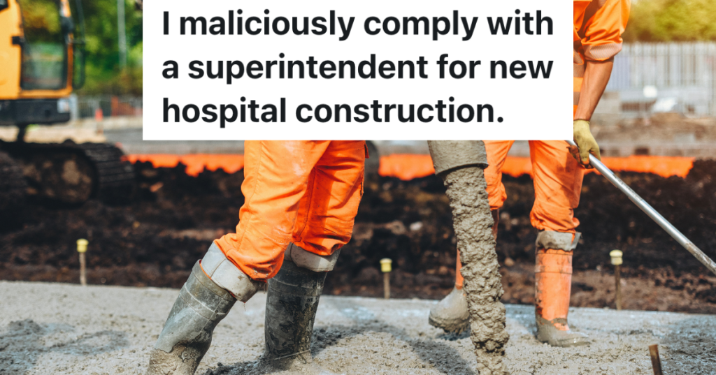 construction workers pouring concrete