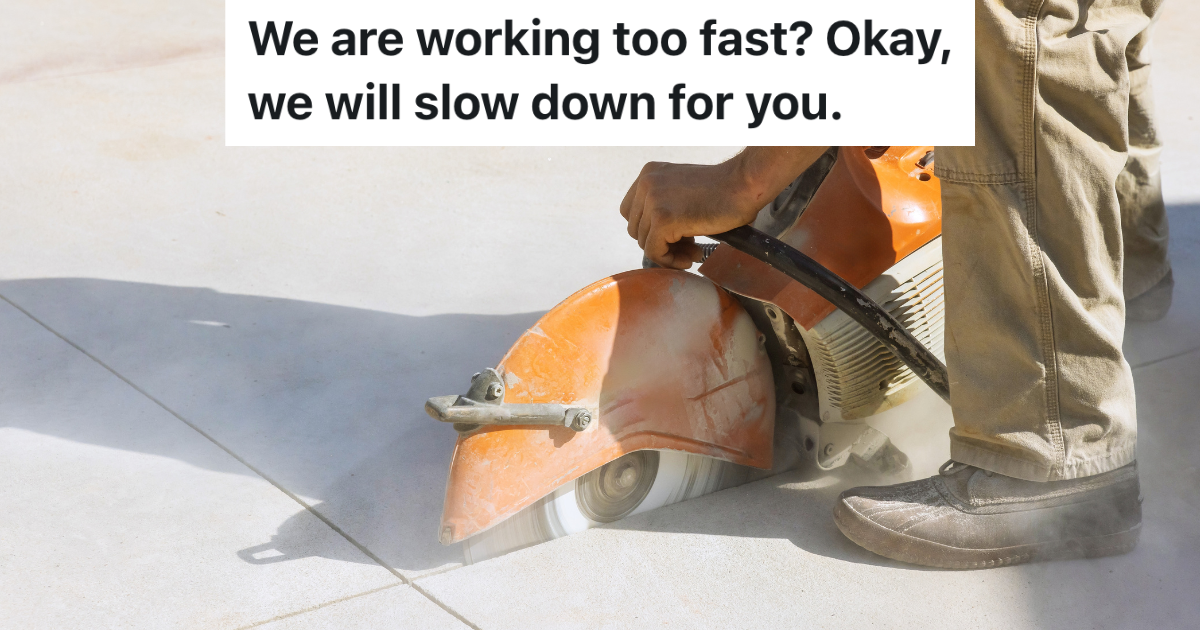 construction worker cutting concrete