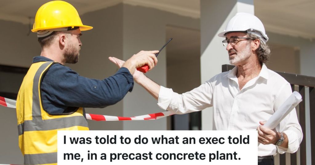 executive talking to construction worker