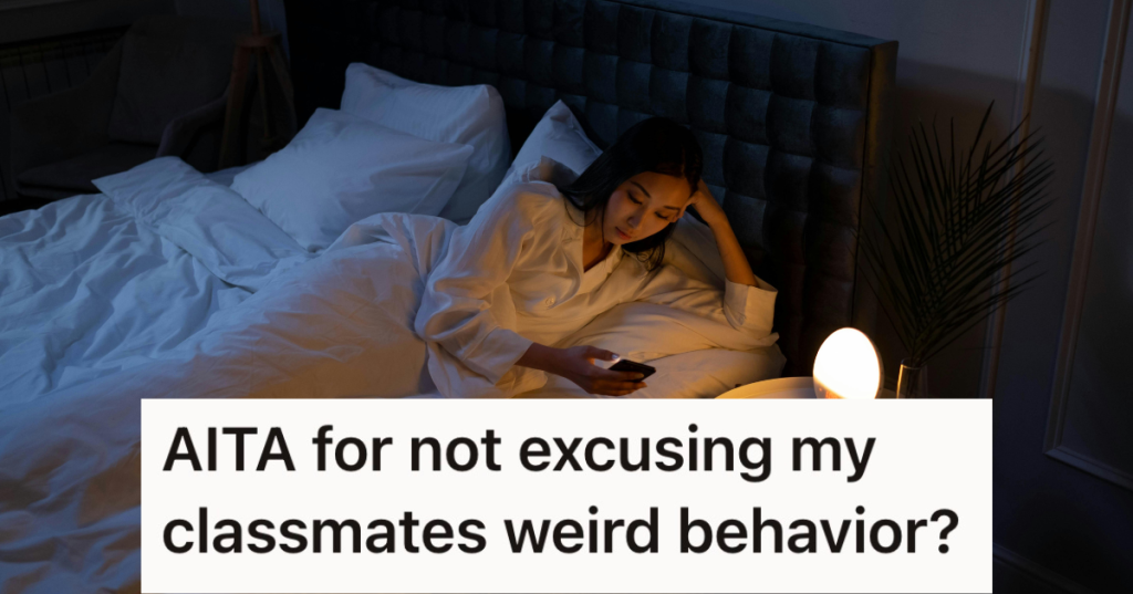 Woman lying on the bed at night looking at her phone