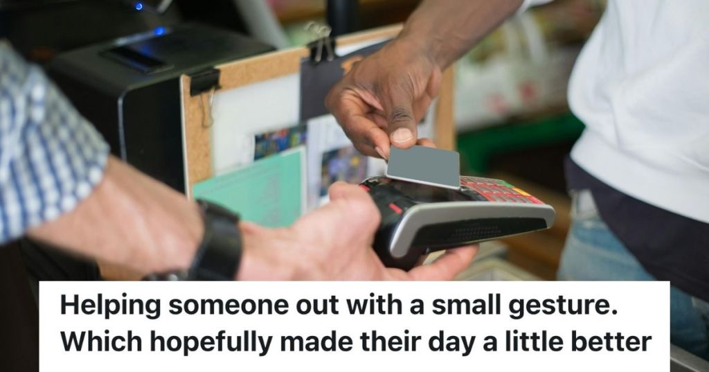 Male customer tapping debit or credit card on terminal