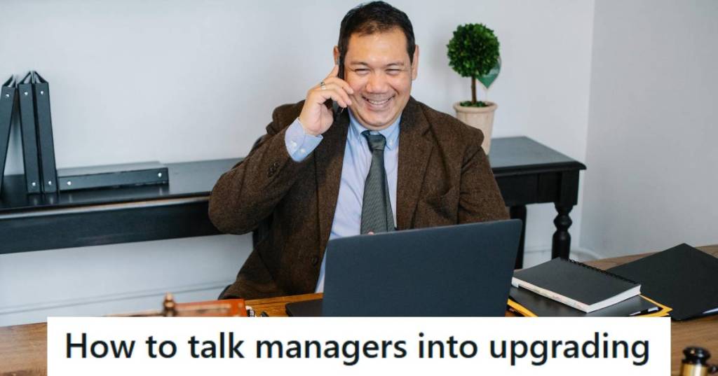 Man on the phone getting his way, so he's smiling