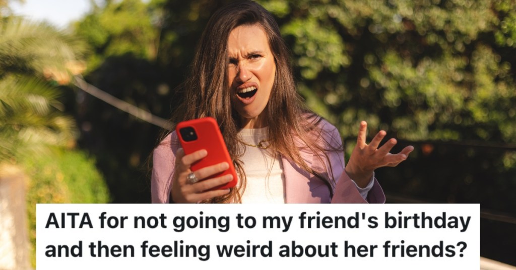 woman looking at her phone