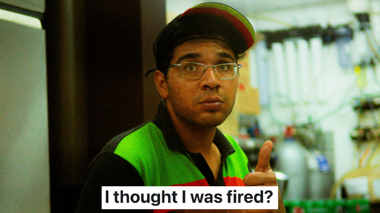 fast food employee giving a thumb's up