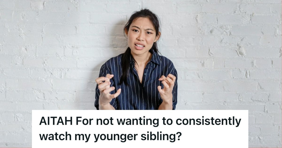 frustrated woman in front of white brick wall