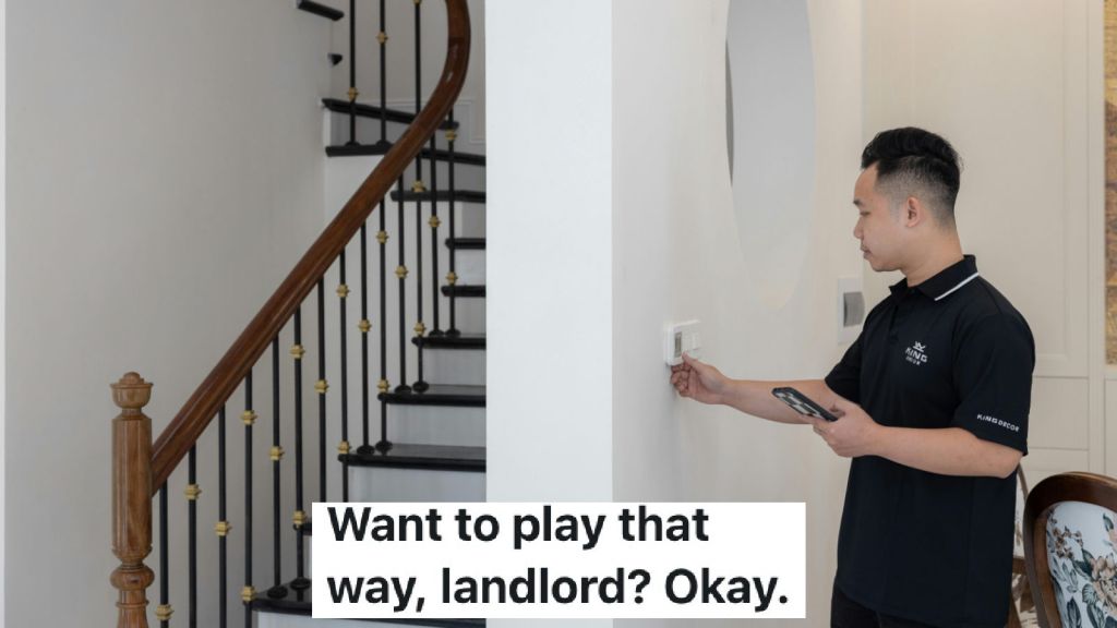 man changing thermostat