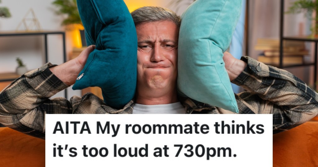 man covering his ears