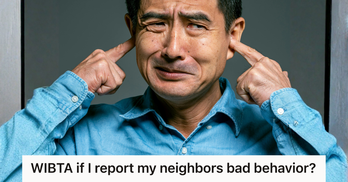 man covering his ears