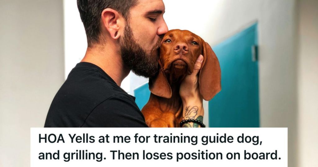 man cuddling with his dog