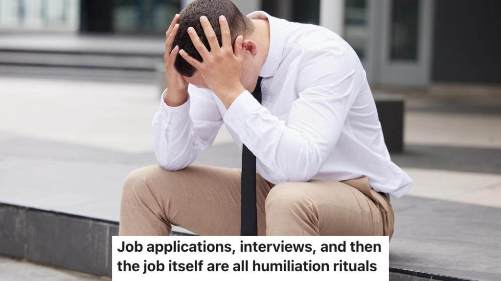 man with his head in his hands