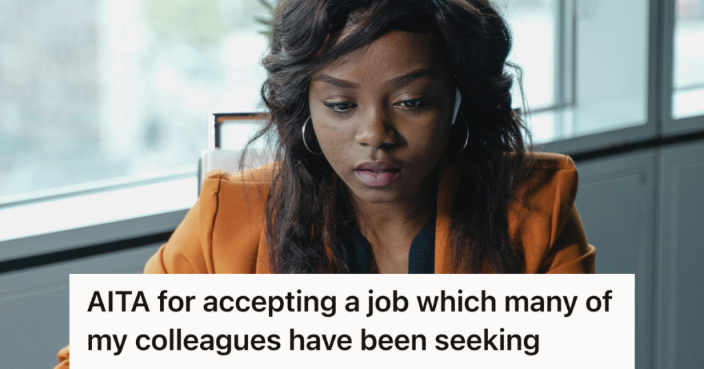 professional woman sitting at her desk