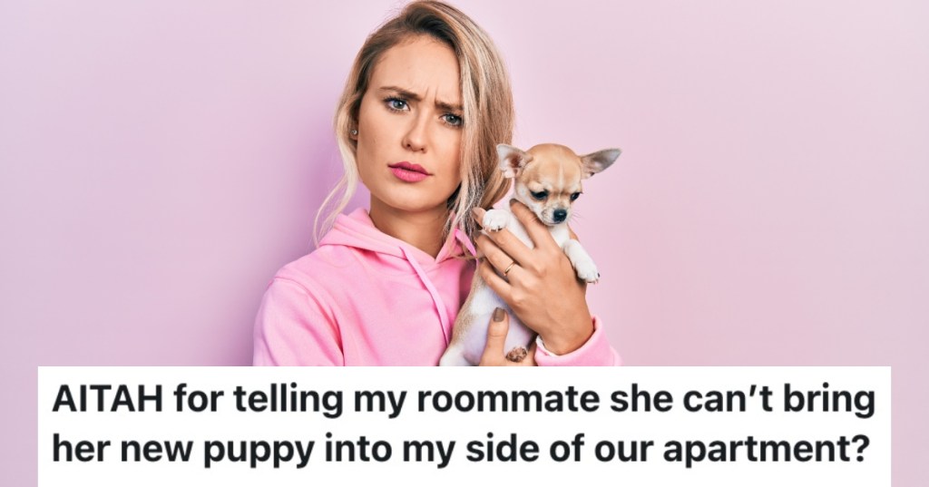 woman holding a puppy