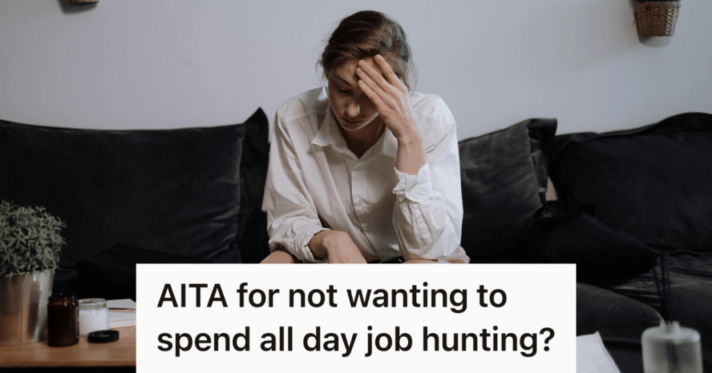 stressed woman sitting on black couch