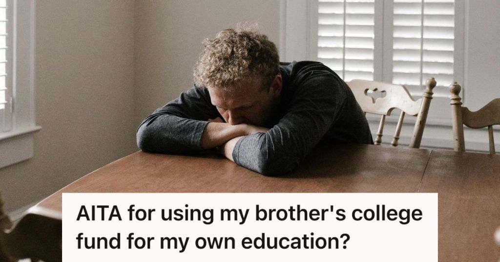 upset man sitting at table
