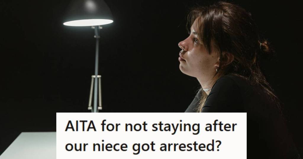 Teen girl sitting in a police station waiting to be bailed out