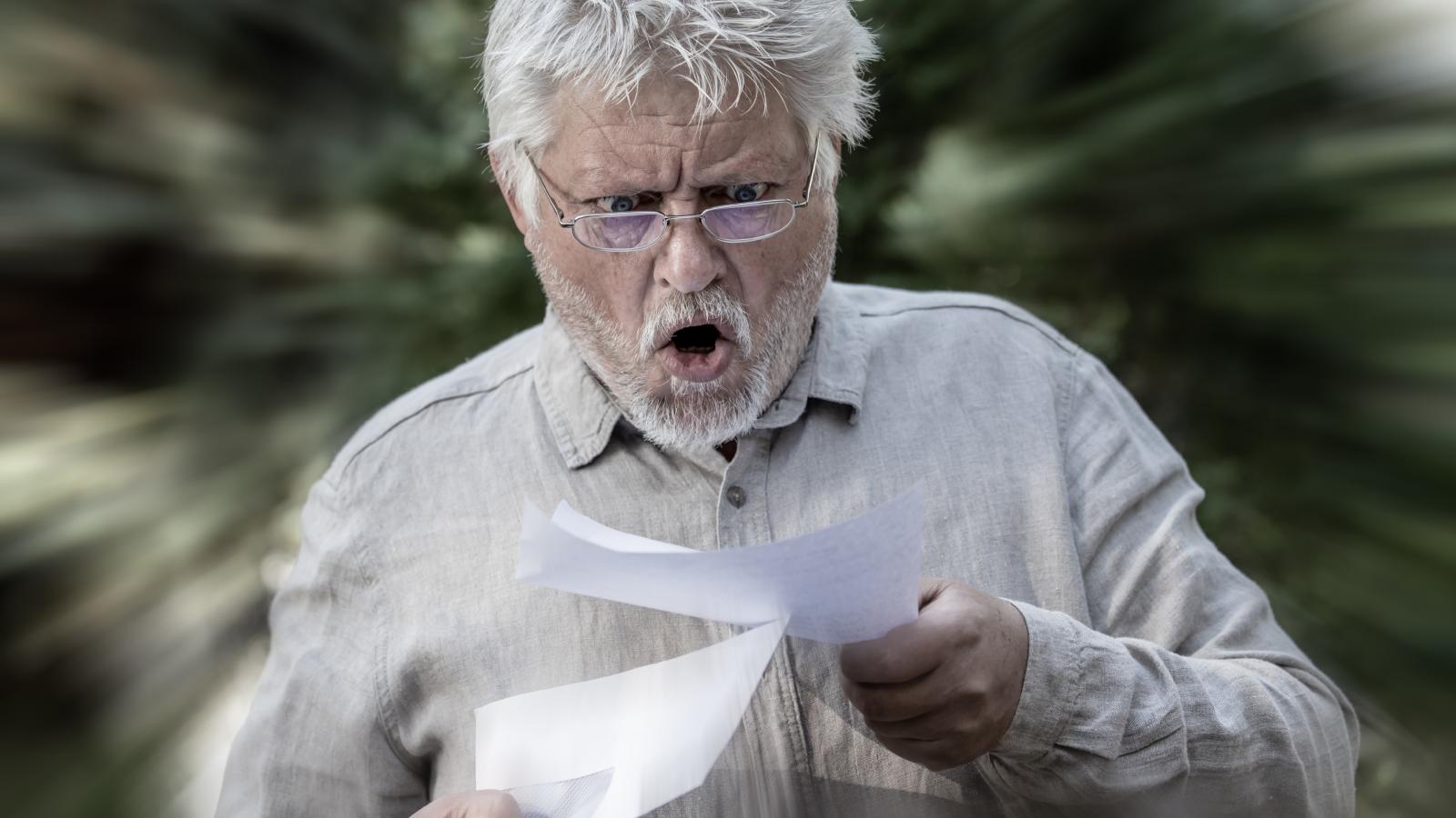 man reading his mail