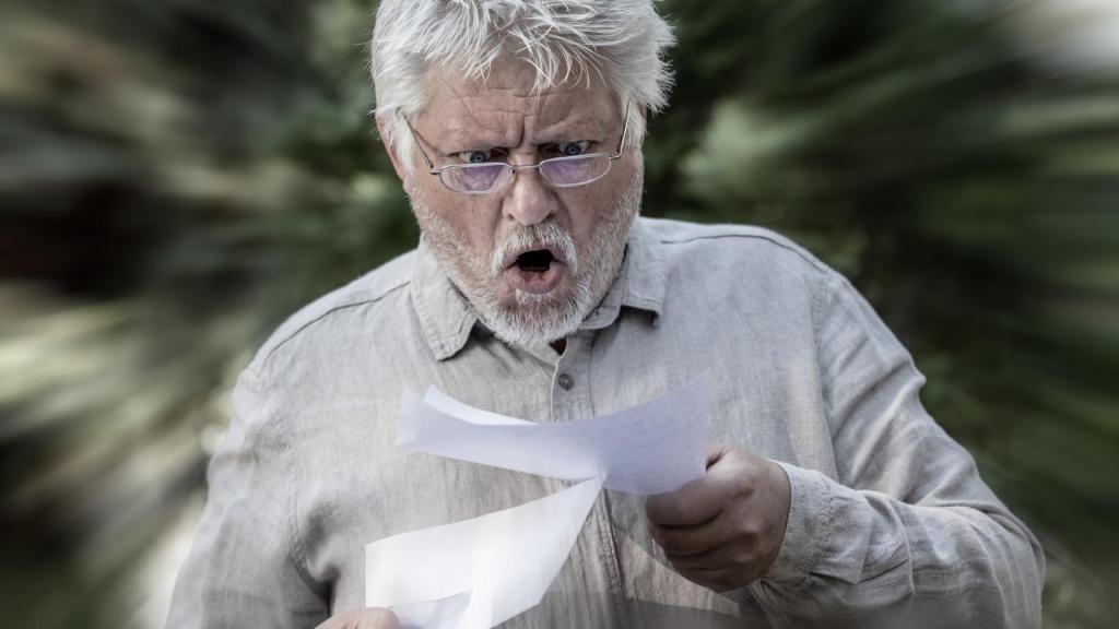 man reading his mail