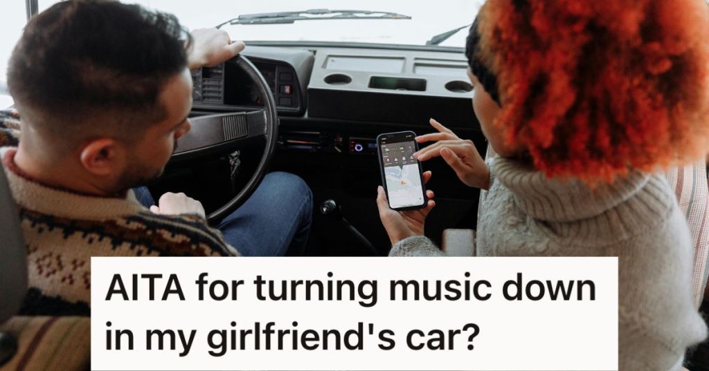 Man driving while woman on the passenger seat looks at her phone