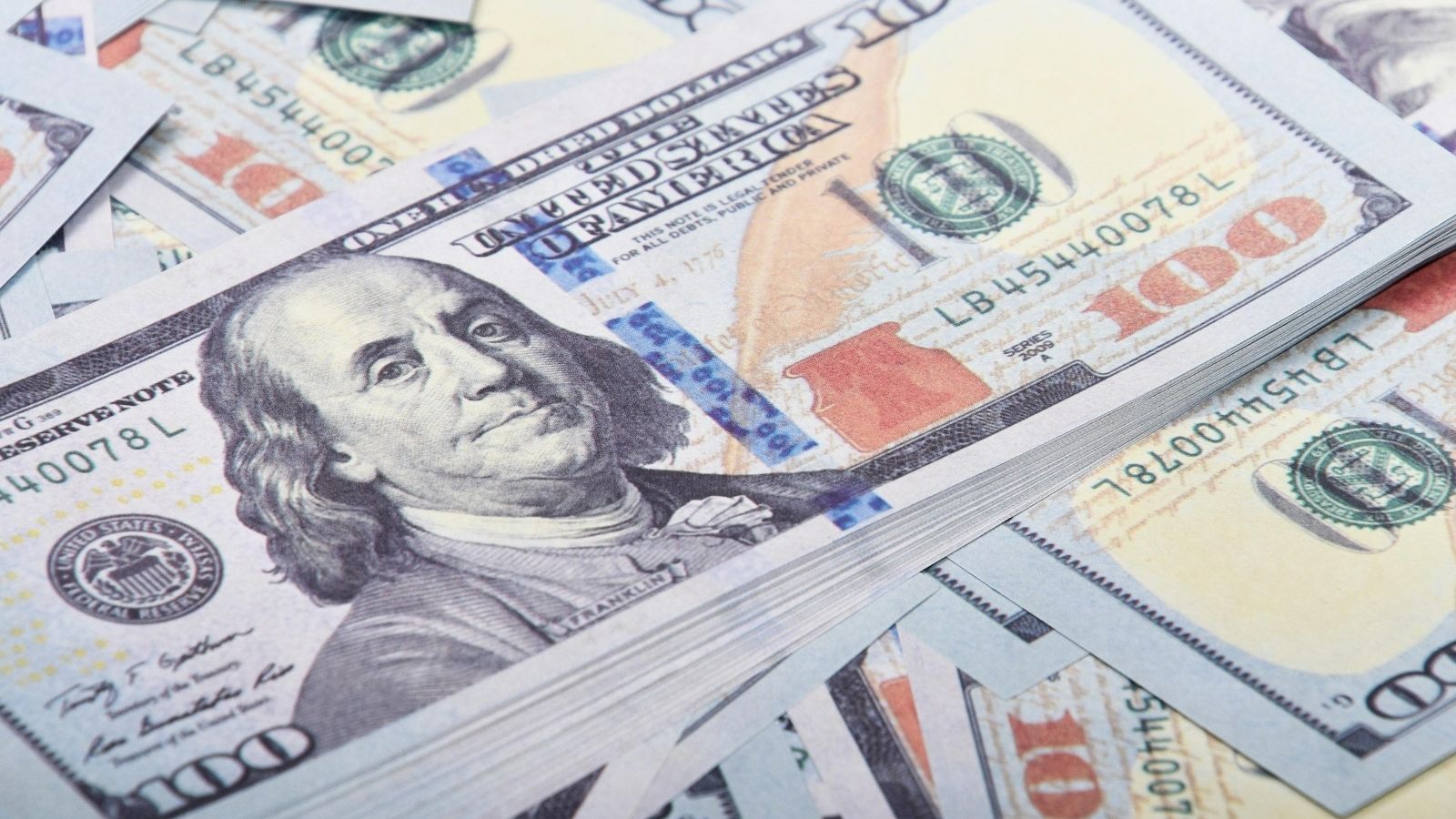 A pile of $100 bills
