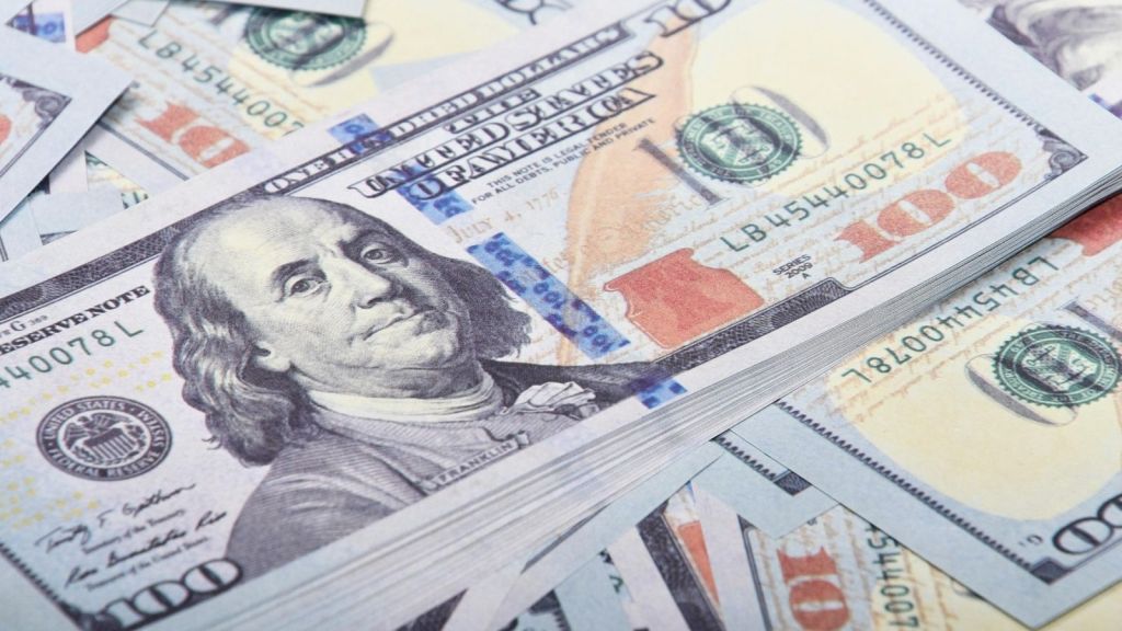 A pile of $100 bills