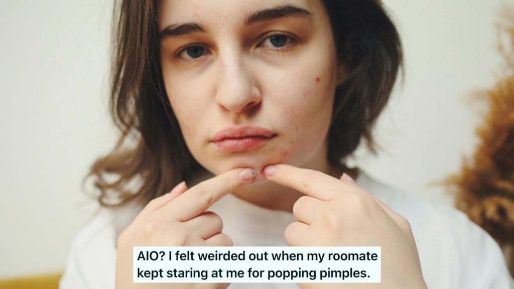 A young woman popping pimples