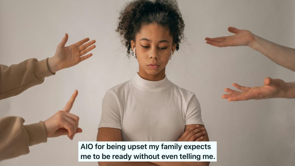 Hand gestures around a teen with folded arms