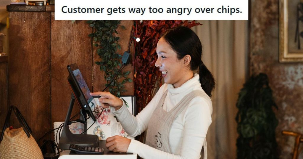 Woman in white working at a cashier