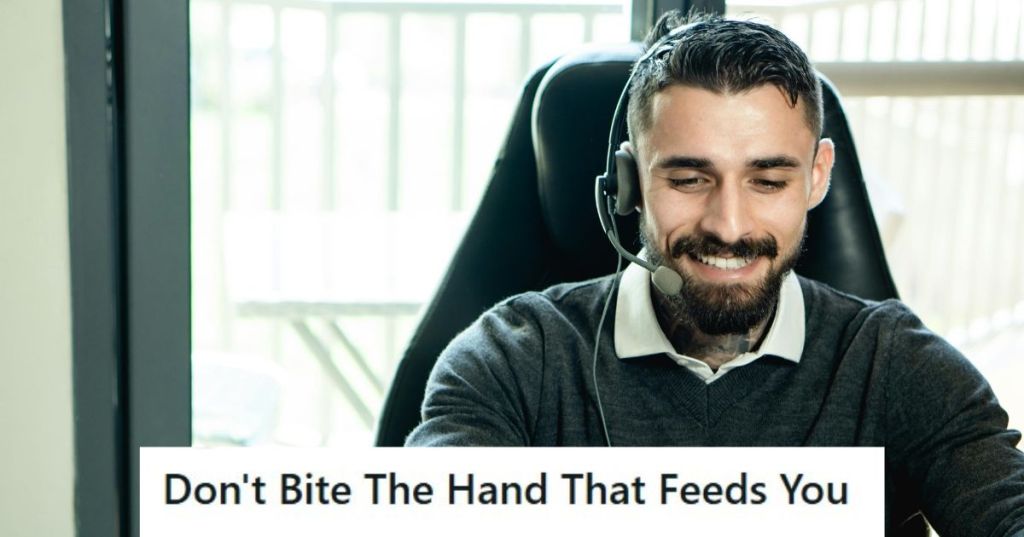 Man in black sweater at work