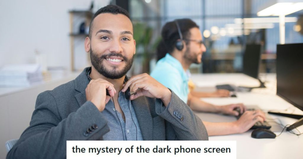 Man in grey suit at work