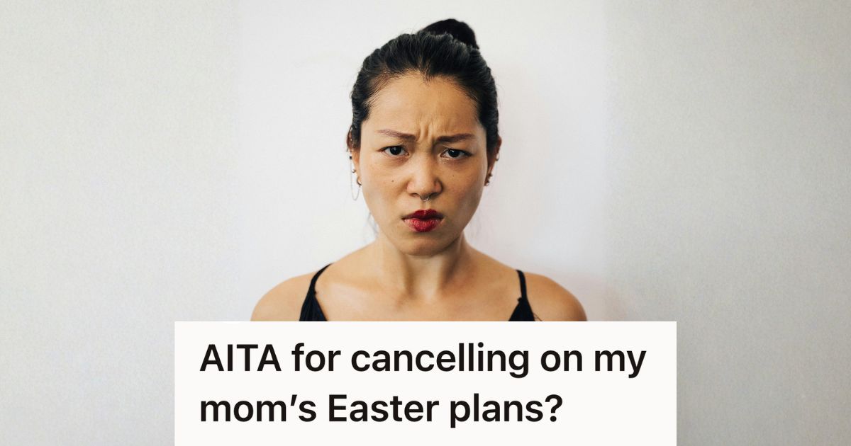 angry woman in black shirt scowling