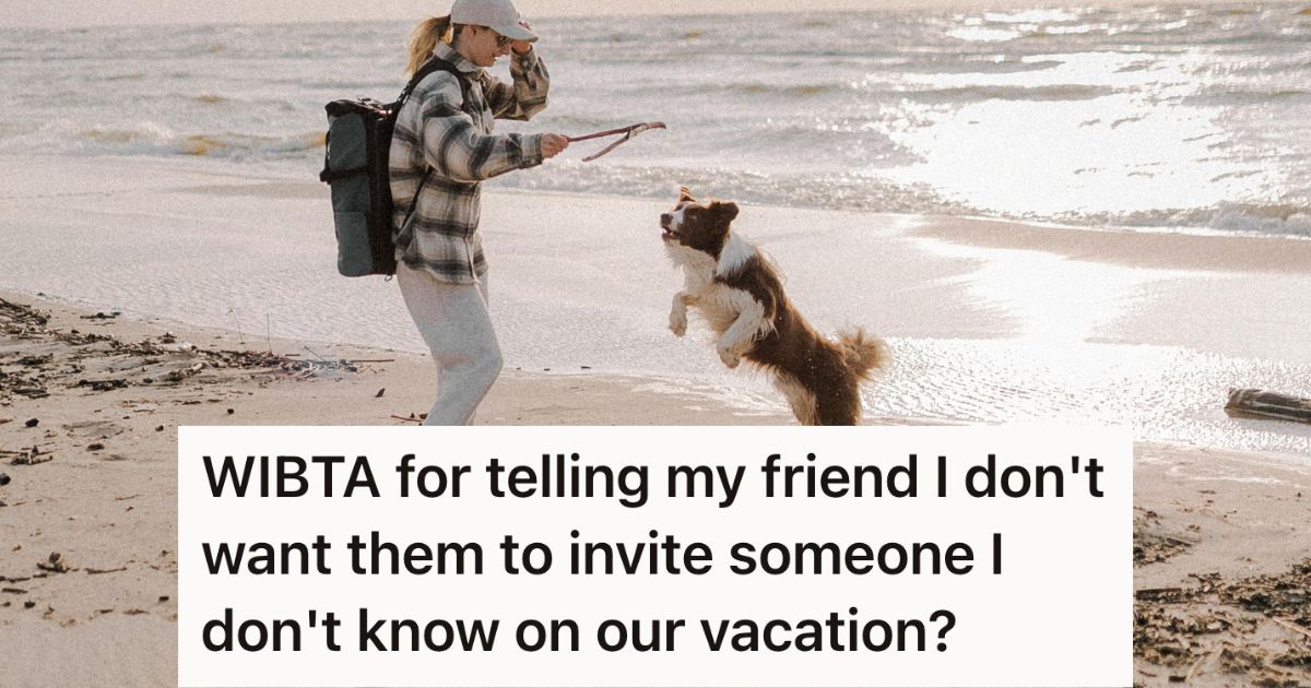 Woman with backpack playing with a dog on the beach