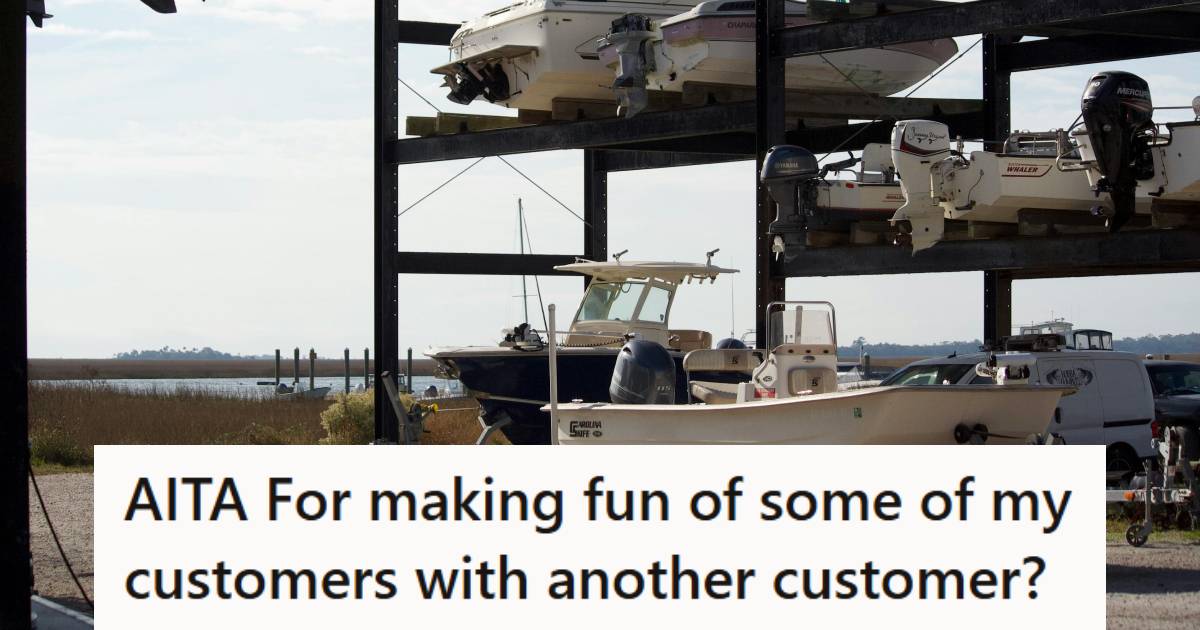 Boats parked in a storage lot on the shores of a big lake
