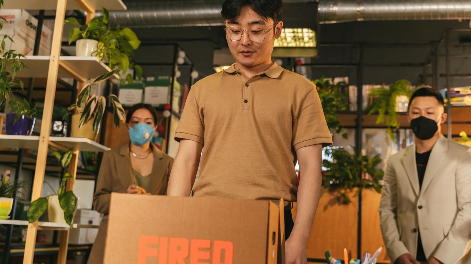 man looking at fired box