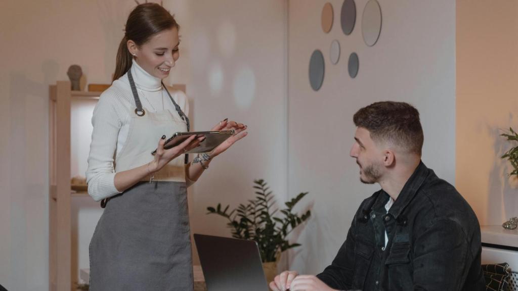 Server taking an order from a customer