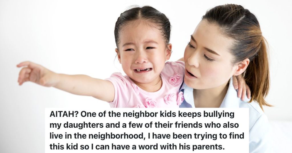 little girl crying and pointing while her mom hugs her